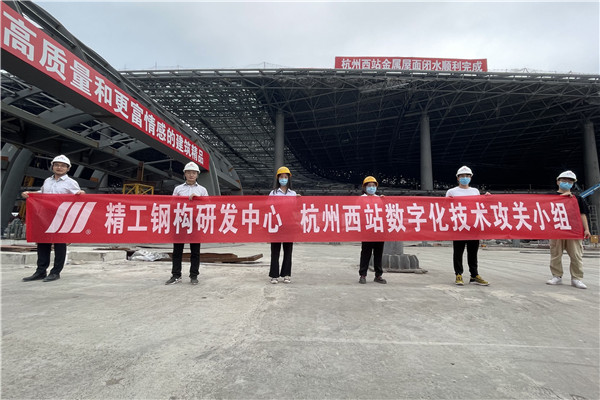 1632360501107290.jpg 数字化技术攻关小组现场合照.jpg